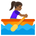 🚣🏾‍♀️ woman rowing boat: medium-dark skin tone display on Google